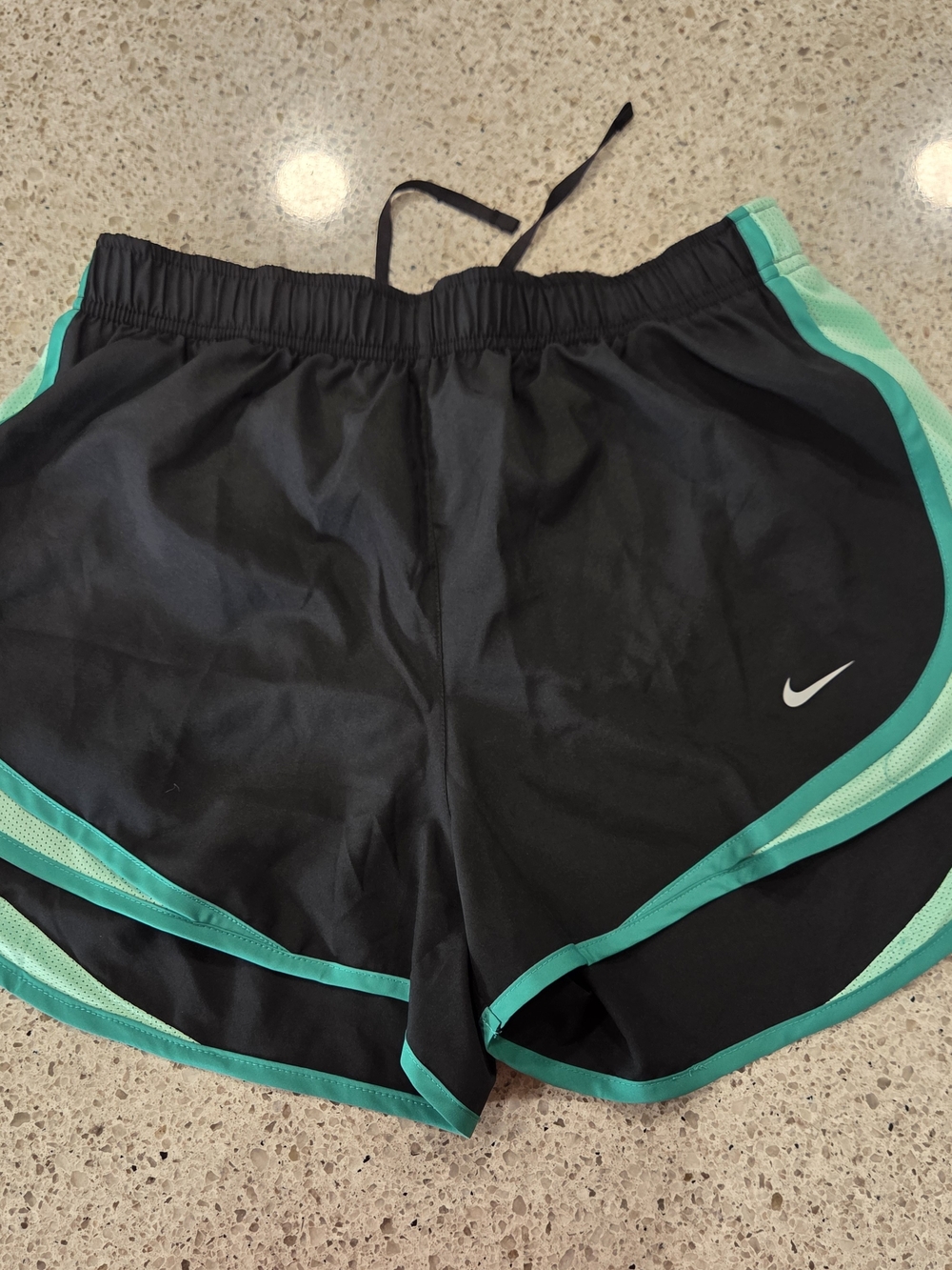 Nike Women's Black Athletic Shorts with Teal Accents